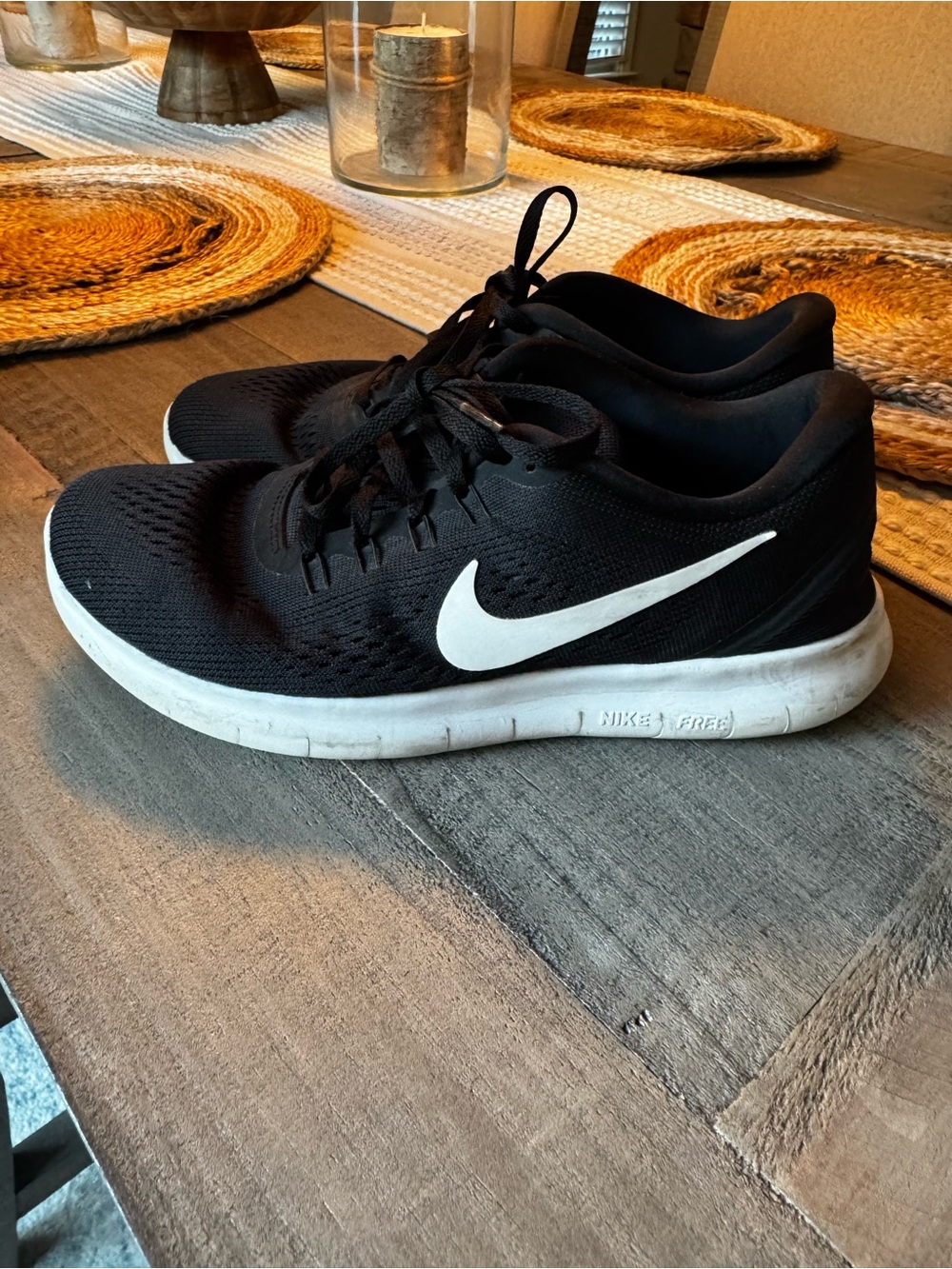 Nike Black Athletic Running Shoes with White Swoosh